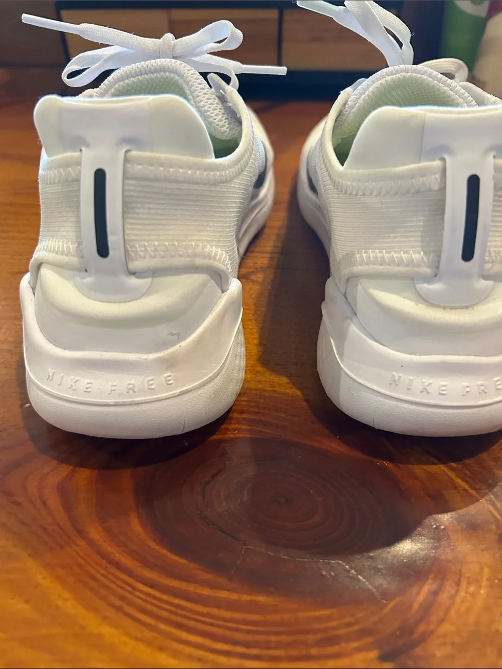 Nike Women’s White Athletic Running Shoes with Black Swoosh